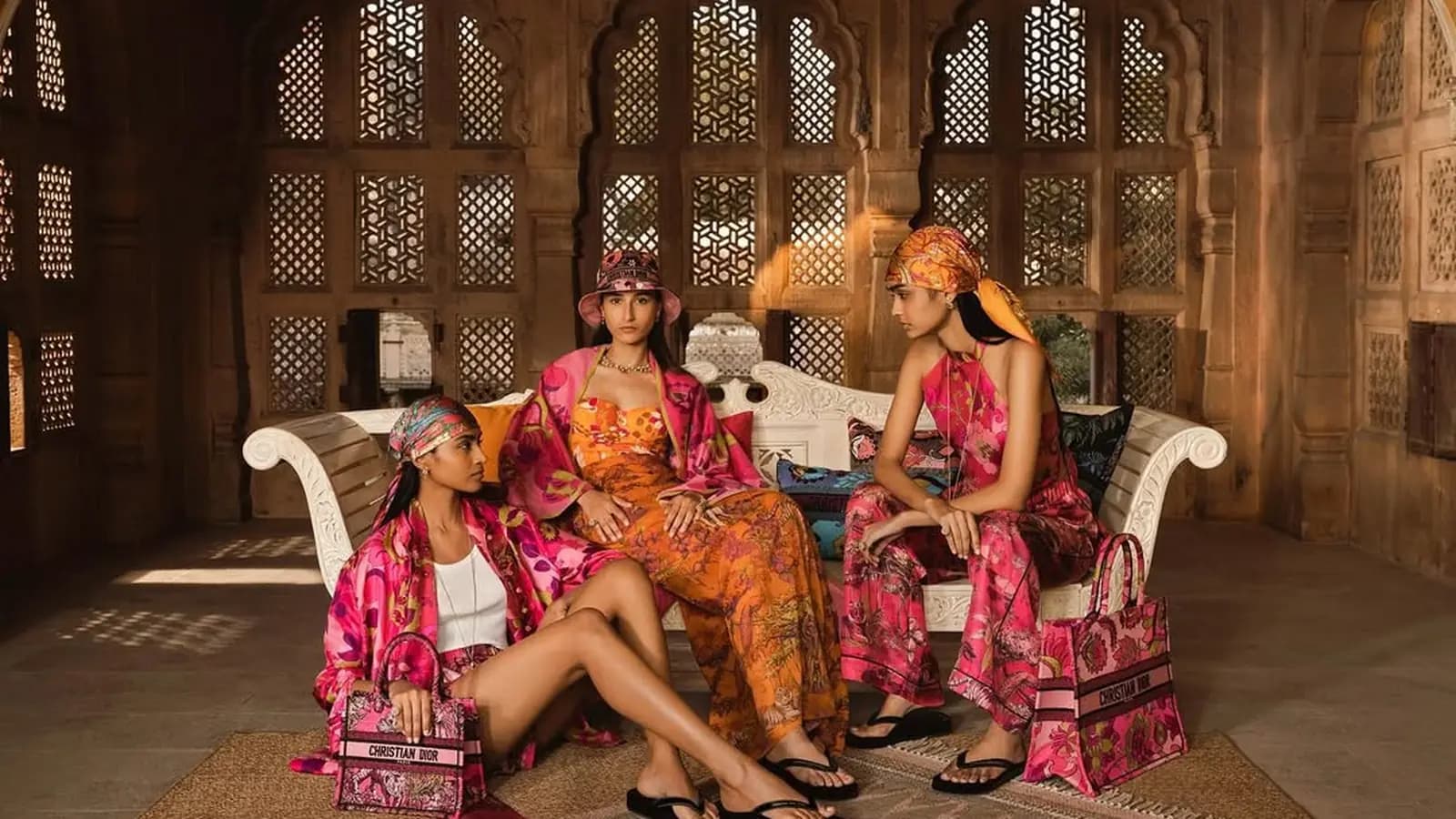 Dior Magazine Fall #42 poster showing two fashion models in patterned dresses against a painted scenic backdrop.