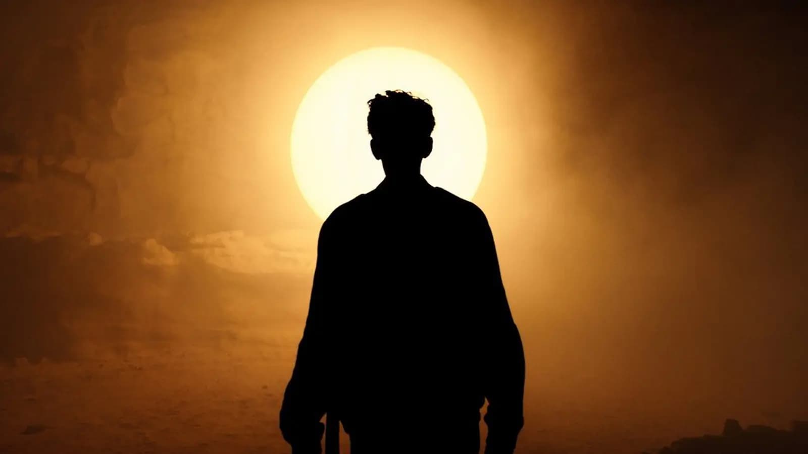 Zara Mirage Film poster showing a silhouetted figure standing before a bright desert sun.