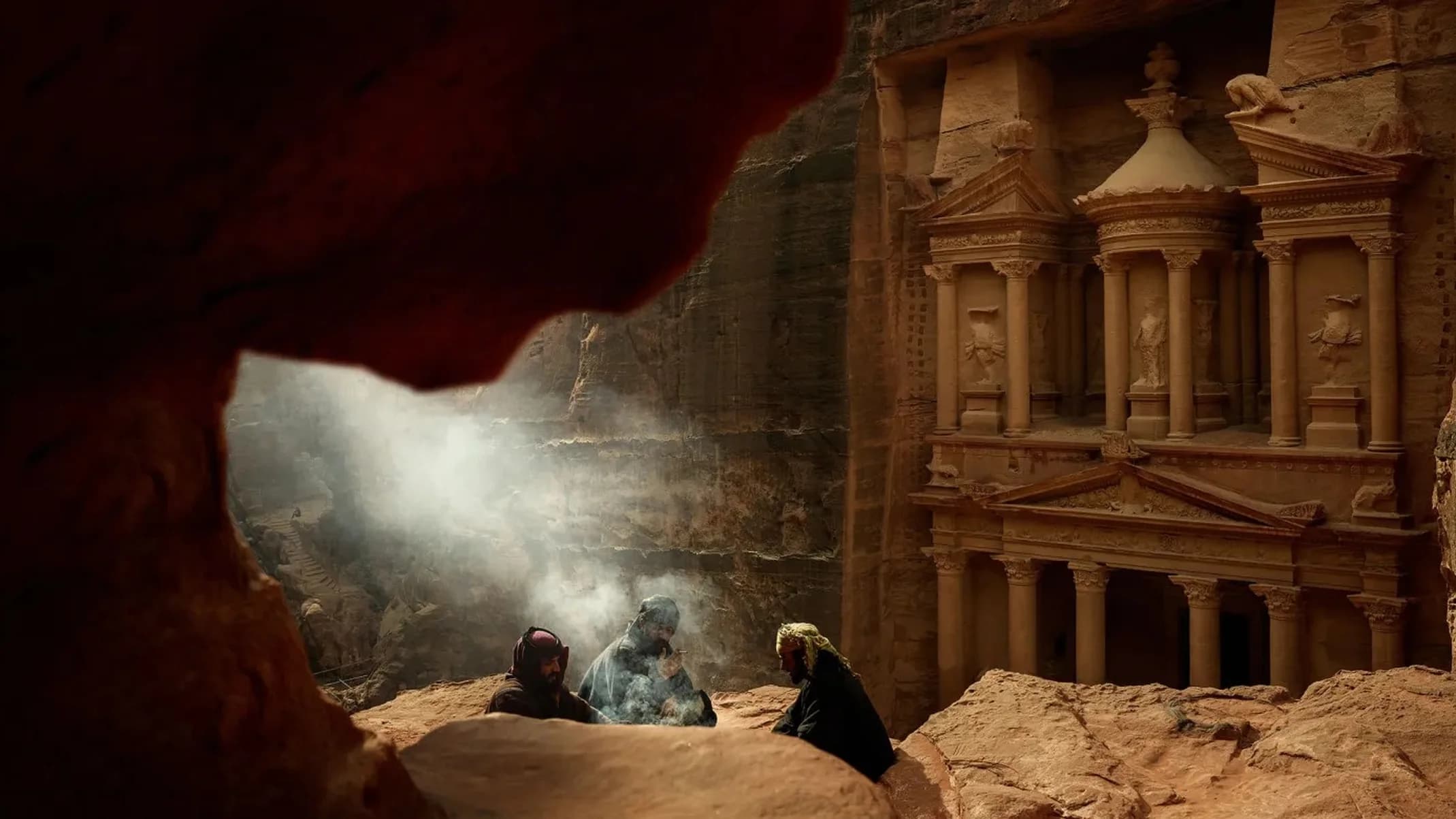 Al Safar travel photography of a climber descending a sandstone rock face while a local guide watches across the desert landscape in Little Petra, Jordan.